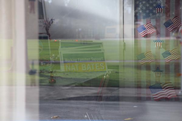 A stack of signs authorized and paid for by Richmond Working Families for Jobs 2014 in Nat Bates’ headquarters. (photo by Harriet Rowan)